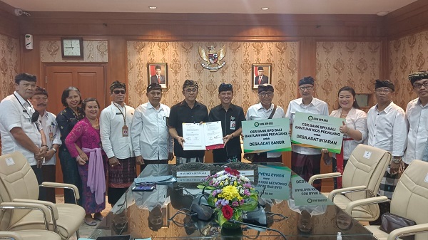 Jaya Negara Saksikan Penandatanganan Perjanjian Kerja Sama Antara Bank BPD Bali Dengan Desa Adat Sanur dan Desa Adat Intaran