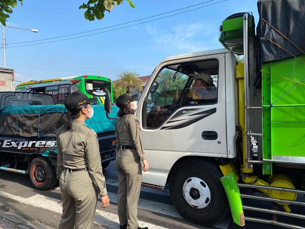 Ingatkan Warga Disiplin Prokes Tim Yustisi Rutin Gelar Pemantauan Prokes