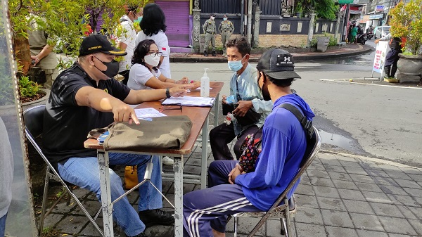 Antisipasi Penularan Covid-19, Tim Yustisi Rutin Ingatkan Masyarakat Terapkan Prokes.